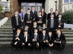 Pictured here are the members of the Irish department in the Abbey Christian Brothers Grammar School, Mr. Maurice Mc Kevitt, Mr. Sean Gallagher, Miss Pauline Friel and Mr. Desmond Tennyson with the winners of the annual Abbey awards for the most fluent speakers of Irish in each year group.  Also in the photograph is the Irish Language Assistant, Mr. Robbie Keenan.